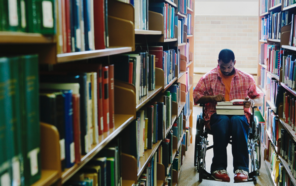 A person in a wheel chair to talk about physical, developmental disabilities.